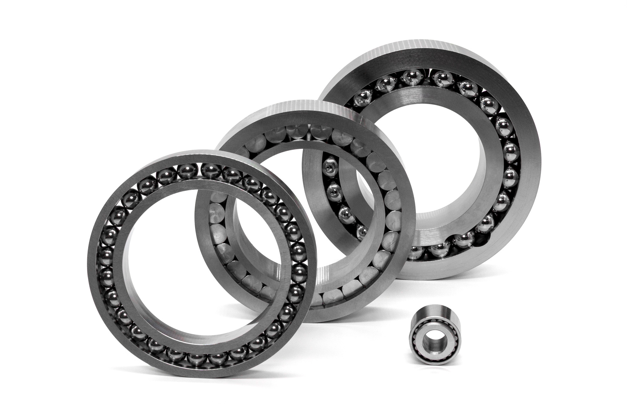 Bearings_Various_02 Four bearings of various sizes on a white background