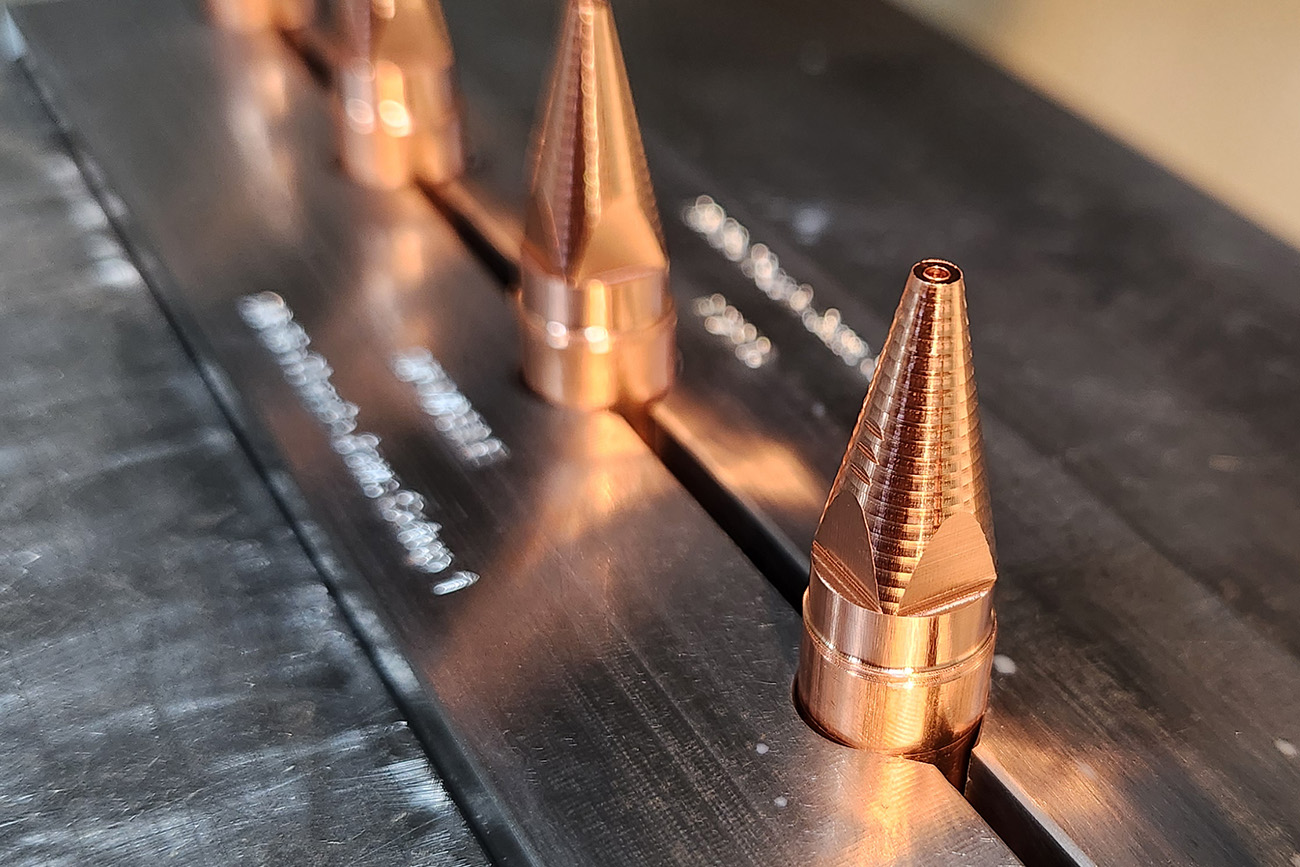 copper meltio print head nozzles being manufactured