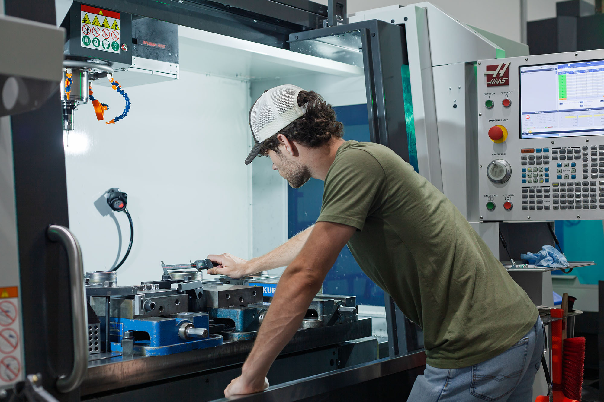 HCP staff measure a hybrid manufactured part